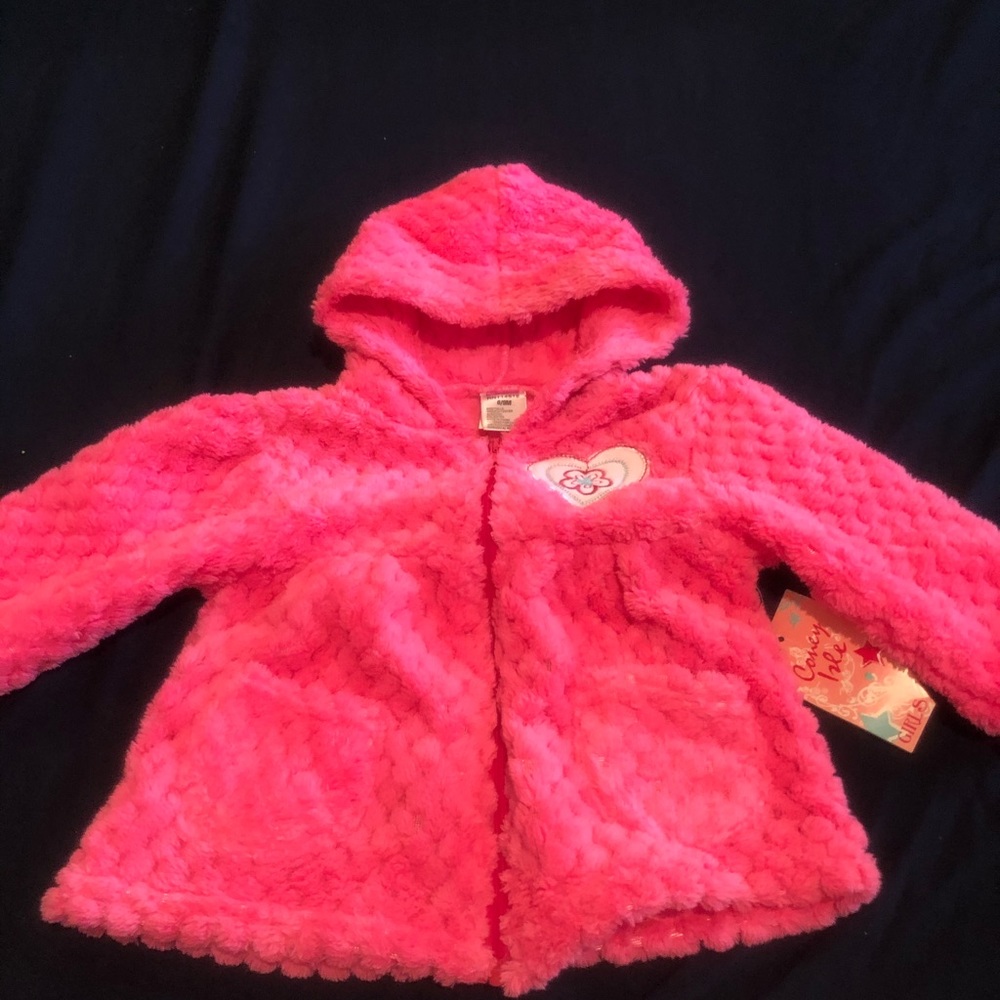 Little girl’s pink jacket